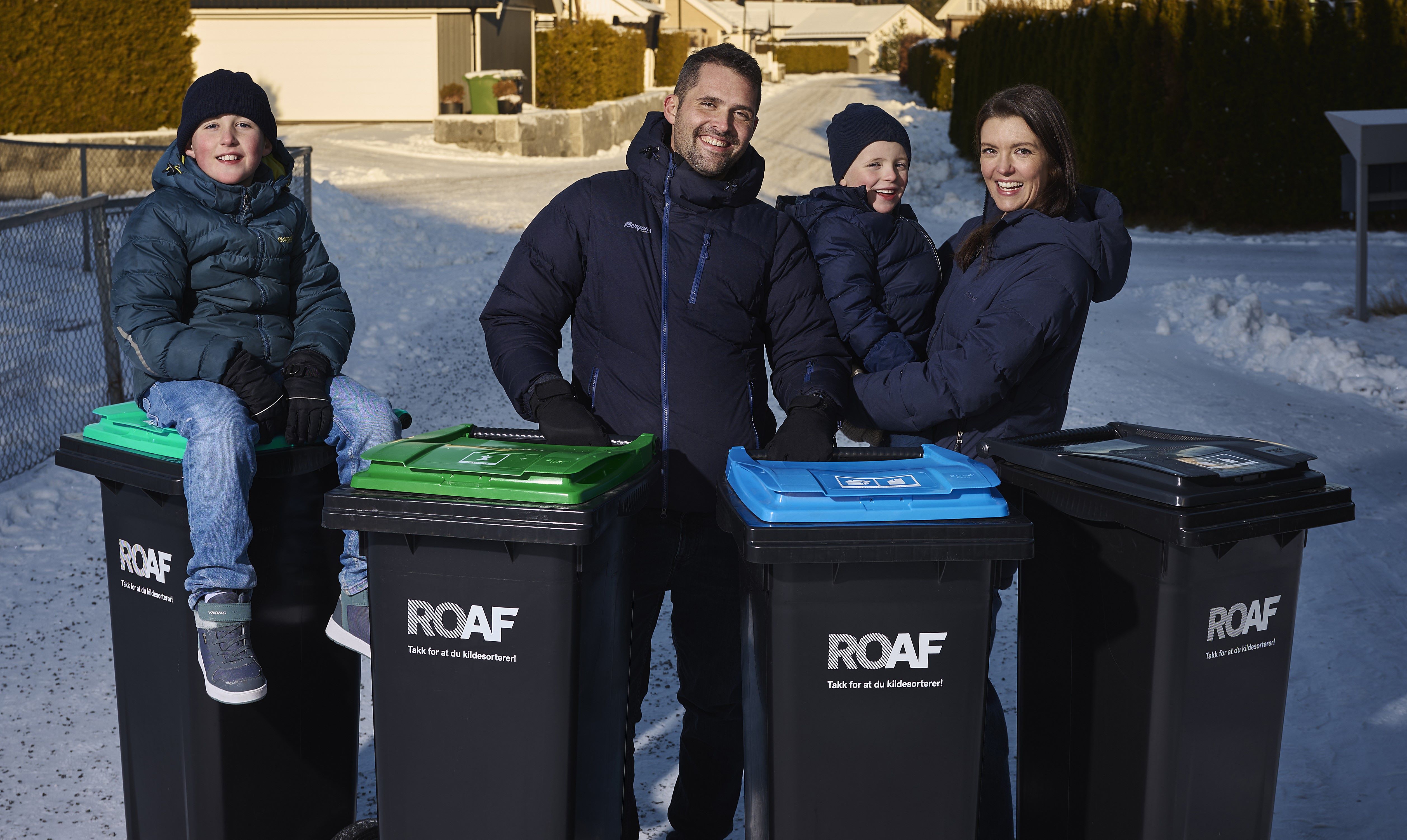 familie med fire beholdere